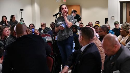 Ivy Treadwell-Garcia speaks during Tuesday's town hall meeting hosted by the ACLU of Georgia and other organizations about the conditions at the Cobb County jail.