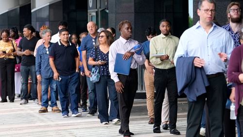 People wait in line to attend a job fair on Aug. 29 in Sunrise, Fla. (Lynne Sladky/AP)