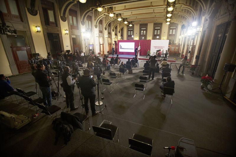 FILE - Mexican President Andres Manuel Lopez Obrador gives his regular morning press conference at the Palacio Nacional in Mexico City, Dec. 18, 2020. (AP Photo/Marco Ugarte, File)