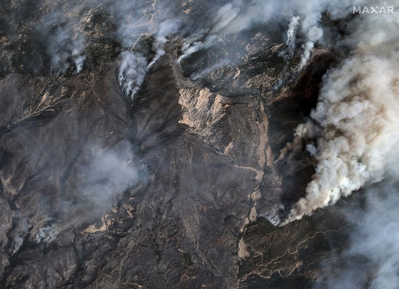 This image released by Maxar Technologies shows fires in Running Springs, Calif., on Wednesday, Sept. 11, 2024. (Satellite image ©2024 Maxar Technologies via AP)