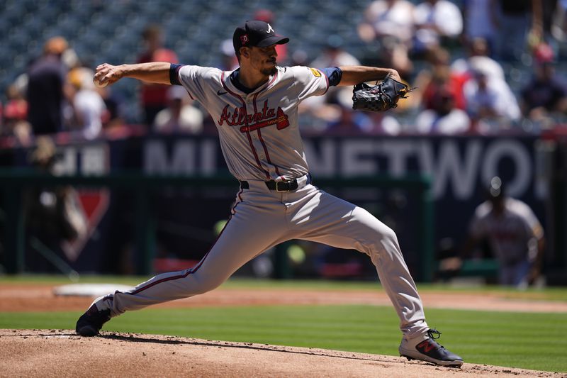 Atlanta Braves starting pitcher Charlie Morton throws during the first inning of a baseball game against the Los Angeles Angels, Sunday, Aug. 18, 2024, in Anaheim, Calif. (AP Photo/Ryan Sun)