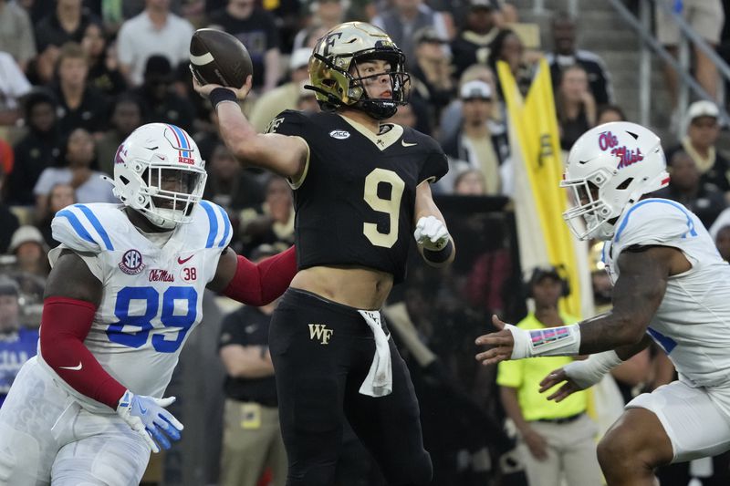 Wake Forest quarterback Hank Bachmeier (9) looks to pass as Mississippi defensive tackle JJ Pegues (89) closes in during the first half of an NCAA college football game in Winston-Salem, N.C., Saturday, Sept. 14, 2024. (AP Photo/Chuck Burton)