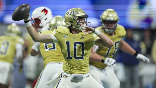 Georgia Tech quarterback Haynes King (10) attempts a pass during the fourth quarter against Louisville in the Aflac Kickoff Game at Mercedes-Benz Stadium, Friday, September 1, 2023, in Atlanta. Georgia Tech lost to Louisville 39-34. (Jason Getz / Jason.Getz@ajc.com)