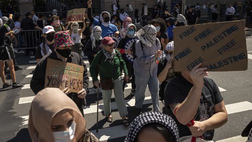 Pro-Palestinian supporters march to Barnard College during the picket line outside Columbia University, Tuesday, Sept. 3, 2024, in New York. (AP Photo/Yuki Iwamura)