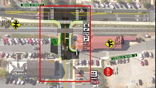 Woodstock is having an engineering consultant draw up initial plans and cost estimates for a new railroad crossing that would connect Mill and Wheeler streets downtown.