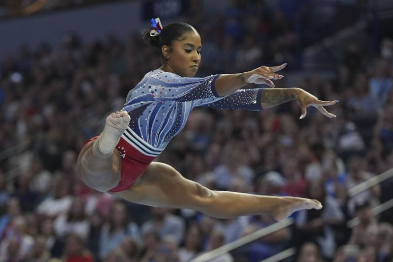 Jordan Chiles competes on the balance beam at the United States Gymnastics Olympic Trials on Friday, June 28, 2024 in Minneapolis. (AP Photo/Abbie Parr)