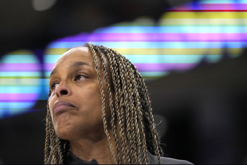 FILE - Chicago Sky head coach Teresa Weatherspoon looks across the court during a WNBA basketball game against the New York Liberty, June 4, 2024, in Chicago. (AP Photo/Charles Rex Arbogast, File)