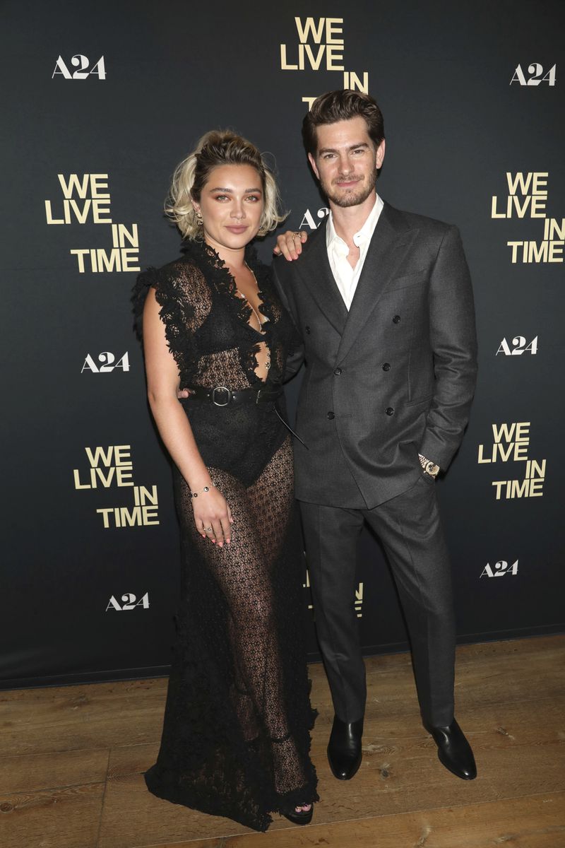 Florence Pugh and Andrew Garfield attend a screening of "We Live in Time" at the Crosby Street Hotel on Monday, Sept. 9, 2024, in New York. (Photo by Greg Allen/Invision/AP)