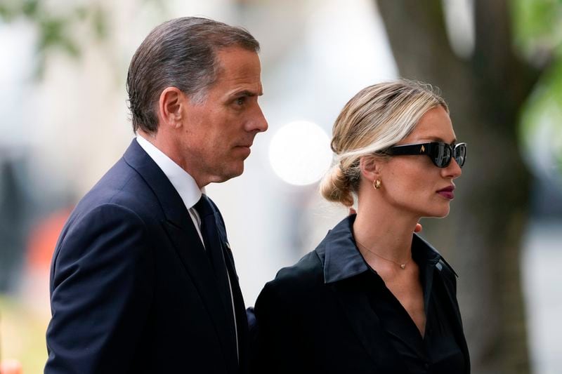 Hunter Biden, left, arrives at federal court with his wife, Melissa Cohen Biden, Wednesday, June 5, 2024, in Wilmington, Del. (AP Photo/Matt Slocum)