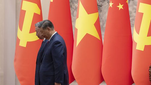 Chinese President Xi Jinping, right, and Vietnam's President To Lam walk out of a signing ceremony at the Great Hall of the People in Beijing Monday, Aug. 19, 2024. (Andres Martinez Casares/Pool Photo via AP)