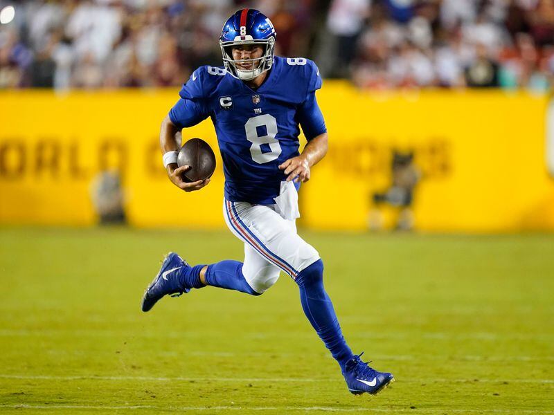 New York Giants quarterback Daniel Jones (8) runs downfield with the ball during the first half against the Washington Football Team, Thursday, Sept. 16, 2021, in Landover, Md. (Patrick Semansky/AP)