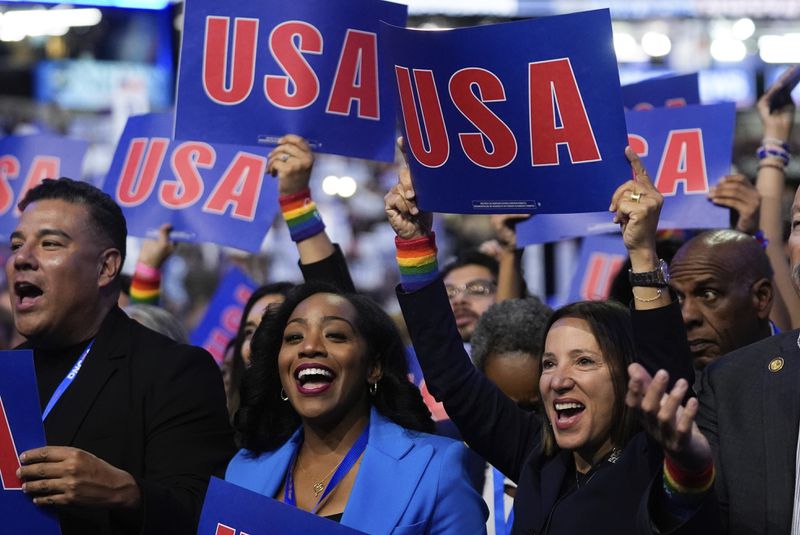 California delegates cheer during the Democratic National Convention Wednesday, Aug. 21, 2024, in Chicago. (AP Photo/Erin Hooley)