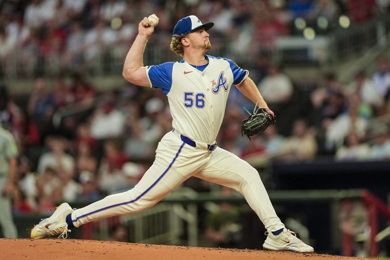 Atlanta Braves pitcher Spencer Schwellenbach (56) works against the Toronto Blue Jays in the third inning of a baseball game, Saturday, Sept. 7, 2024, in Atlanta.(AP Photo/Mike Stewart)