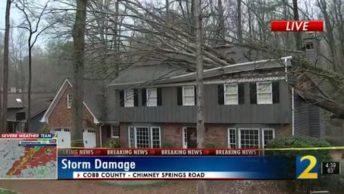 Strong storms that moved through North Georgia knocked down trees Friday afternoon.