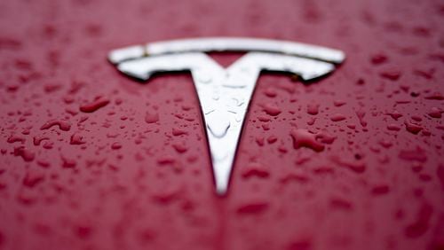 FILE - A Tesla logo is shown on Feb. 27, 2024, in Charlotte, N.C. (AP Photo/Chris Carlson, File)