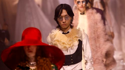 A model wears a creation as part of the Valentino Spring/Summer 2025 collection presented Sunday, Sept. 29, 2024 in Paris. (Photo by Vianney Le Caer/Invision/AP)