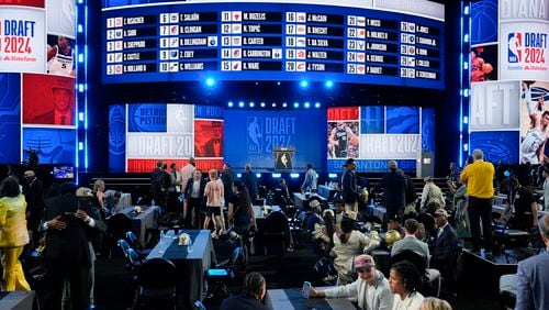 Names of all 30 first round picks fill the NBA basketball draft board at the end of the first round, Wednesday, June 26, 2024, in New York. (AP Photo/Julia Nikhinson)