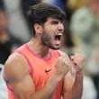 Carlos Alcaraz of Spain reacts after winning against Jannik Sinner of Italy during their men's singles finals match of the China Open tennis tournament, at the National Tennis Center in Beijing, Wednesday, Oct. 2, 2024. (AP Photo/Achmad Ibrahim)