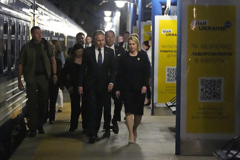 U.S. Secretary of State Antony Blinken is accompanied by U.S. Ambassador to Ukraine Bridget Brink as he prepares to depart the train station in Kyiv, Ukraine, Wednesday, Sept. 11, 2024. (AP Photo/Mark Schiefelbein, Pool)