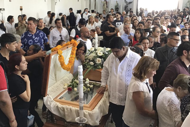 Supporters of slain Mayor Alejandro Arcos attend a mass service one week after he took office, in Chilpancingo, Mexico, Monday, Oct. 7, 2024. (AP Photo/Alejandrino Gonzalez)