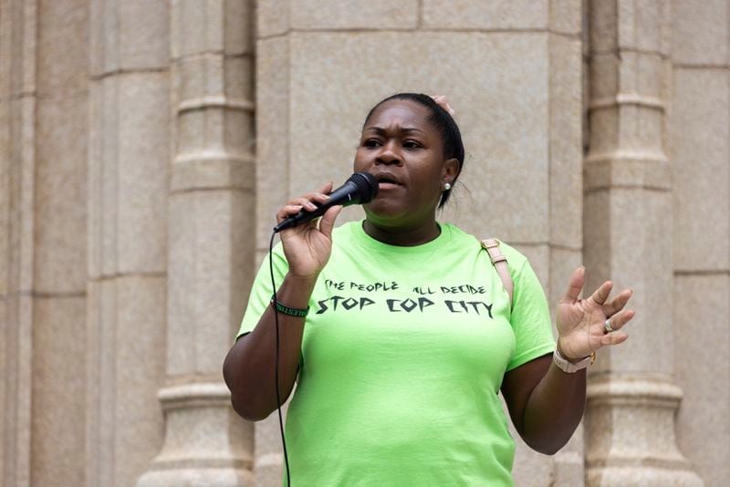 Rev. Keyanna Jones Moore speaks at a protest against the under-construction law enforcement training center, known to some as Cop City, at City Hall in Atlanta on Monday, Sept. 16, 2024. It's been one year since opponents submitted a petition to force a referendum to block the project. (Arvin Temkar/Atlanta Journal-Constitution via AP)