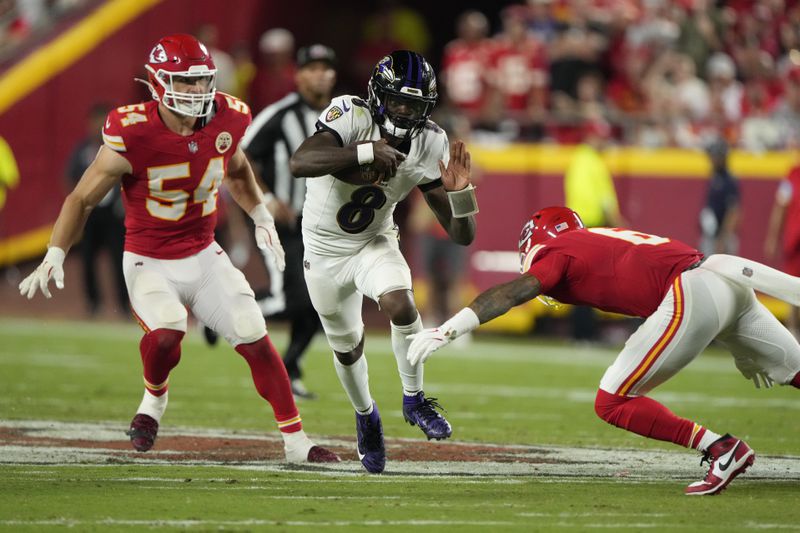 Baltimore Ravens quarterback Lamar Jackson (8) runs with the ball as Kansas City Chiefs safety Bryan Cook, right, and linebacker Leo Chenal (54) defend during the second half of an NFL football game Thursday, Sept. 5, 2024, in Kansas City, Mo. (AP Photo/Charlie Riedel)