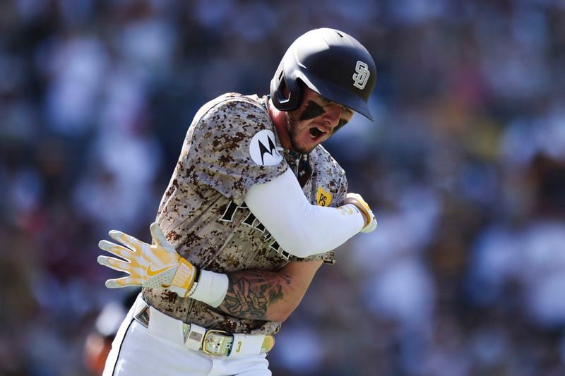 San Diego Padres' Jackson Merrill reacts after flying out to right field in the seventh inning of a baseball game against the Chicago White Sox, Sunday, Sept. 22, 2024, in San Diego. (AP Photo/Derrick Tuskan)