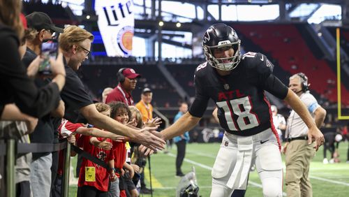 Atlanta Falcons quarterback Kirk Cousins greets fans before their game against the Jacksonville Jaguars in their preseason NFL football game at Mercedes-Benz Stadium, on Friday, Aug. 23, 2024, in Atlanta. (Jason Getz / AJC)
