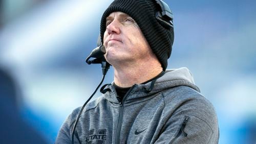 Utah State head coach Blake Anderson looks up a the videoboard late in second half of the Famous Idaho Potato Bowl NCAA college football game against Georgia State, Saturday, Dec. 23, 2023, in Boise, Idaho. The former Utah State coach's response to the school's termination letter says he was fired for “convenience,” not for cause, and that the investigation that led to his dismissal was a “sham.” (AP Photo/Steve Conner,Fiel)