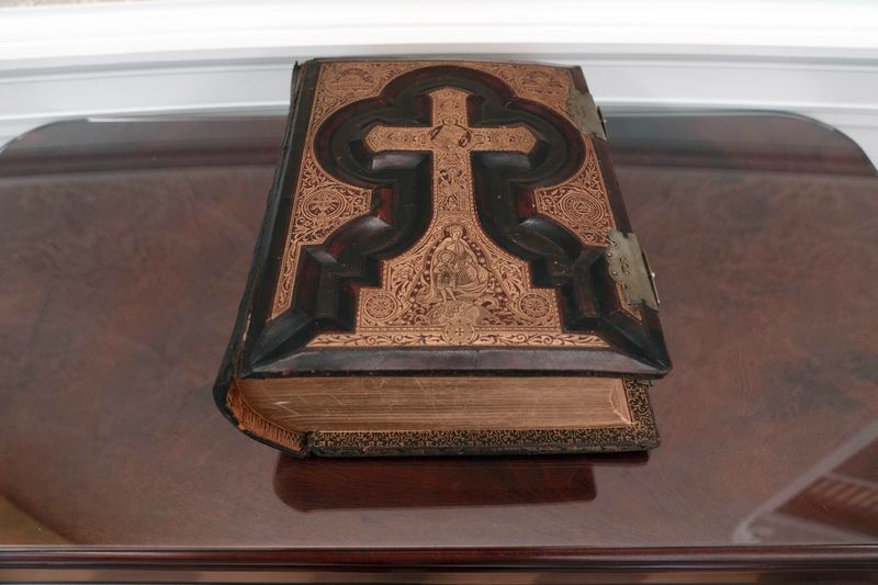 The replica of President Joe Biden family bible is seen in a replica of the Oval Office as is today, shown at The People's House exhibit, Monday, Sept. 16, 2024 in Washington. (AP Photo/Jose Luis Magana)