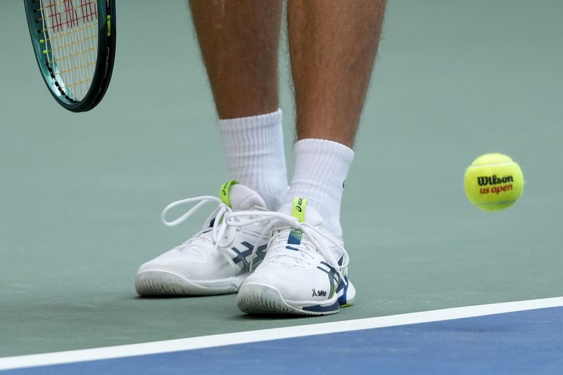 FILE - Alex de Minaur, of Australia, prepares to serve to Jack Draper, of Great Britain, during the quarterfinals of the U.S. Open tennis championships, Sept. 4, 2024, in New York. (AP Photo/Pamela Smith, File)