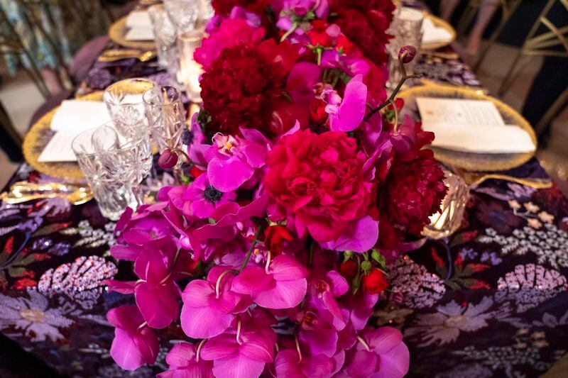 A colorful floral centerpiece is seen atop a sequined table cloth during a preview of the State Dinner with Kenya, Wednesday, May 22, 2024, ahead of Thursday evening's State Dinner with Kenya's President William Ruto, at the White House in Washington. (AP Photo/Jacquelyn Martin)