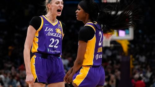 Los Angeles Sparks forward Cameron Brink, left, reacts after forward Rickea Jackson drew a foul during the first half of a WNBA basketball game against the Las Vegas Aces, Sunday, June 9, 2024, in Los Angeles. (AP Photo/Ryan Sun)