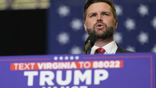 FILE - Republican vice presidential candidate Sen. JD Vance, R-Ohio, speaks at a campaign rally, July 22, 2024, in Radford, Va. Vance introduced himself to the world in 2016, when he published his bestselling memoir, "Hillbilly Elegy," under the name J.D. Vance — with periods between the initials for James David. Over the course of his 39 years, Vance's first, middle and last names have all been altered in one way or another. Vance's name has been the source of both questions and curiosity, including why he no longer uses periods in "JD." (AP Photo/Julia Nikhinson, File)