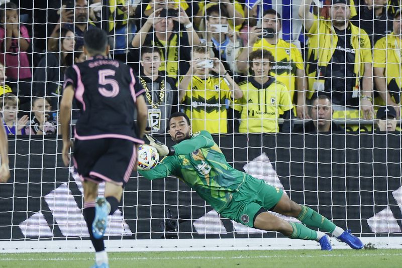 Inter Miami's Drake Callender makes a save on a Columbus Crew penalty kick during the second half of an MLS soccer match, Wednesday, Oct. 2, 2024, in Columbus, Ohio. (AP Photo/Jay LaPrete)