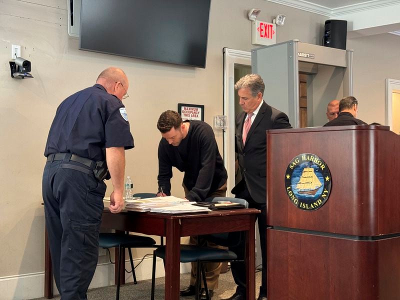 Justin Timberlake, center, appears in court with his attorney Edward Burke, Friday, Sept. 13, 2024, in Sag Harbor, N.Y. (T E McMorrow/Pool Photo via AP )