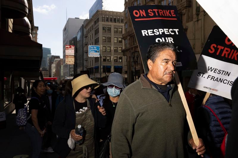 Hotel workers picket outside the Westin St. Francis Monday, Sept. 2, 2024, in San Francisco. (AP Photo/Benjamin Fanjoy)