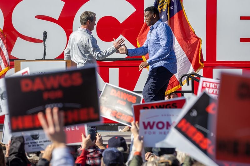 Gov. Brian Kemp's approach to Donald Trump in this year's presidential campaign is likely to mirror his handling in 2022 of scandal-scarred Herschel Walker, the GOP's U.S. Senate nominee that year. Kemp and Walker largely avoided each other on the campaign trail until the final weeks before the election. Kemp scored a decisive victory in his reelection bid, and Walker fell in a runoff to Democratic U.S. Sen. Raphael Warnock. (Steve Schaefer/steve.schaefer@ajc.com)