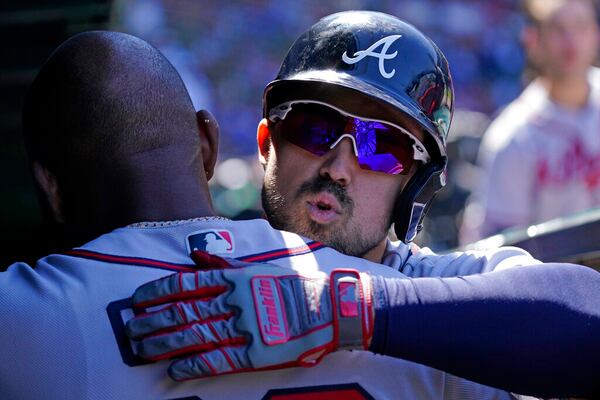 Adam Duvall celebrates during a 2022 game with the Braves.