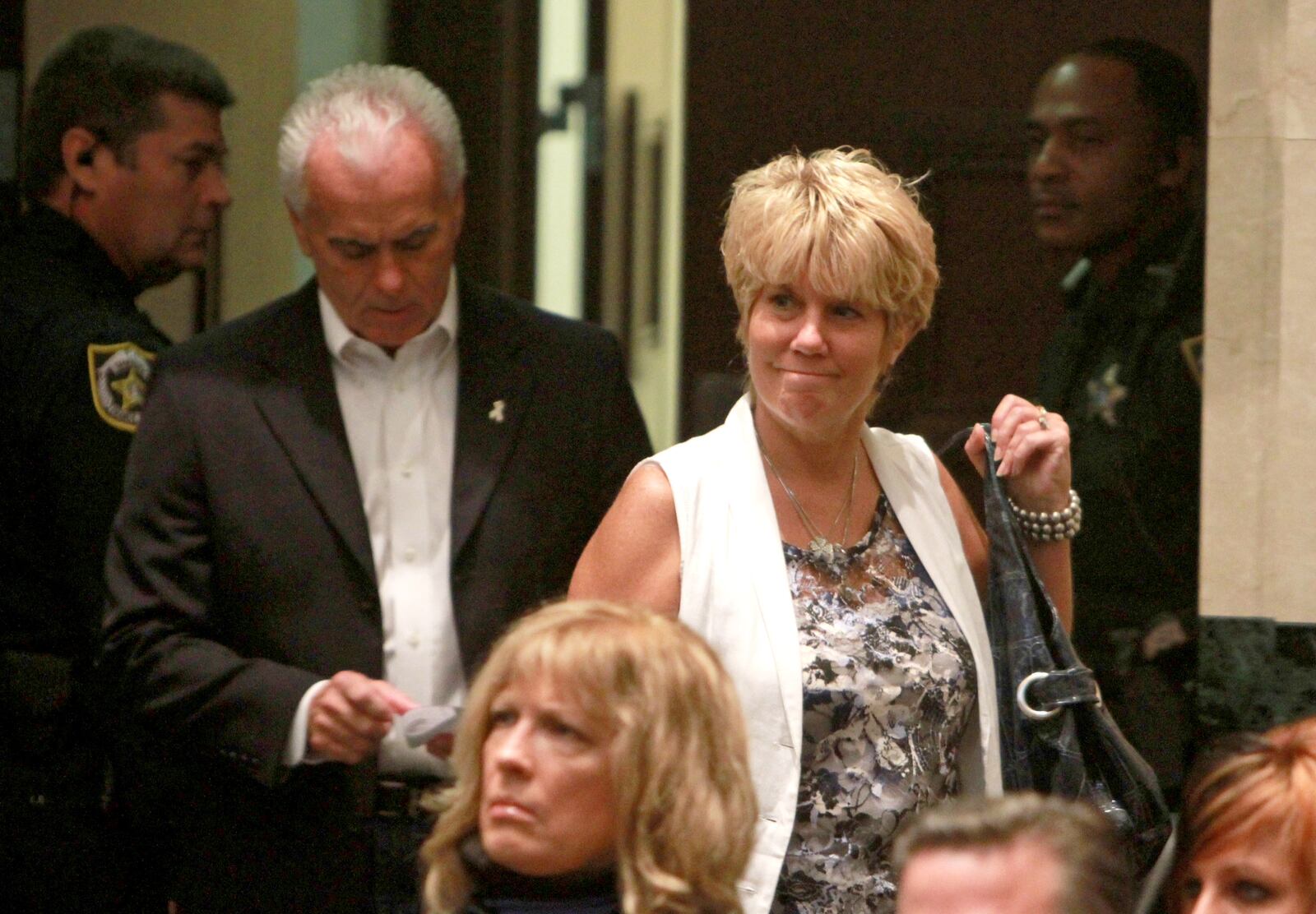 George and Cindy Anthony enter the courtroom of their daughter, Casey Anthony's sentencing on charges of lying to a law enforcement officer at the Orange County Courthouse July 7, 2011 in Orlando. (Joe Burbank-Pool/Getty Images)