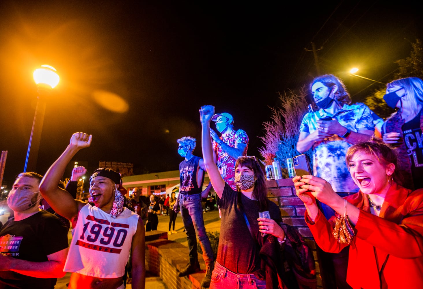 As elections results become more clear, Biden supporters take to the streets in Decatur and East Altanta to celebrate President-Elect Joe Biden and his VP Kamala Harris on Saturday, Nov 7, 2020.  (Jenni Girtman for The Atlanta Journal-Constitution)