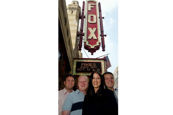 Brandon Mize, Tom Cook, Lucy Lawler and Josh Antenucci of Rival Entertainment in front of the Fox Theatre in 2004 PHIL SKINNER/ AJC