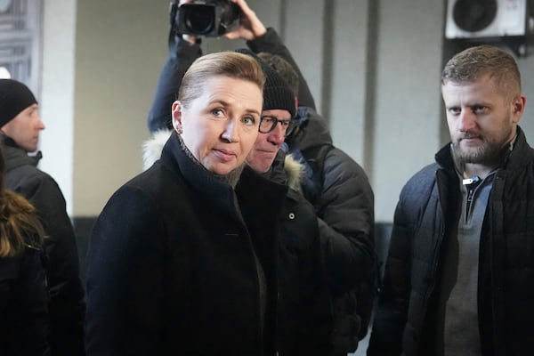 Denmark's Prime Minister Mette Frederiksen arrives in Ukraine's capital Kyiv on the third anniversary of the Russian invasion of Ukraine, Monday, Feb. 24, 2025. (AP Photo/Efrem Lukatsky)