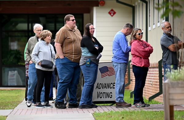 Voters line up to enter North Cobb Senior Center for early voting this week in Acworth.