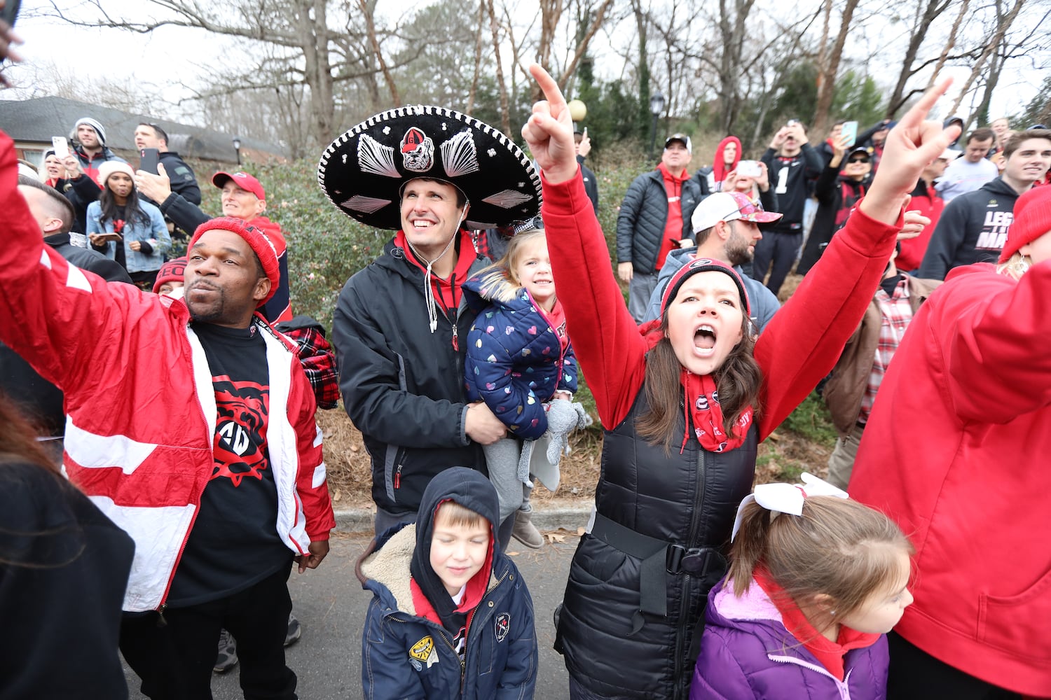 Georgia Bulldogs  fans celebrate the team's National Champions during the victory parade at the UGA campus on Saturday, January 15, 2022 Miguel Martinez for The Atlanta Journal-Constitution