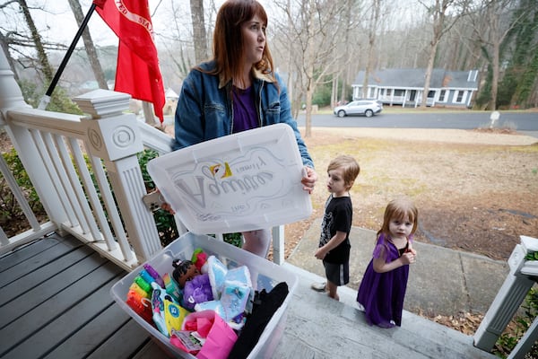 Katherine Knelson recently delivered toys for Antuan and Lexi Aguirre's 2-year-old daughter, Sienna. The Aguirre family is receiving kind support from Knelson and other neighbors following a fire that damaged much of their home.
