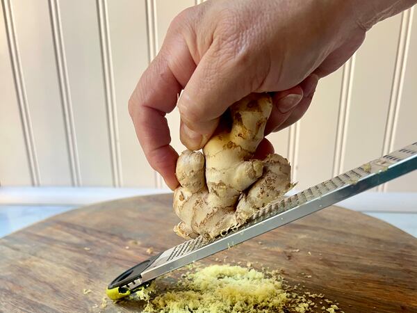 To prevent ginger from shriveling in the refrigerator, store it in the freezer and grate it while frozen. (Virginia Willis for The Atlanta Journal-Constitution)