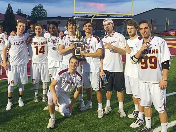 Lacrosse players for the Lassiter Trojans. (Special to the AJC)