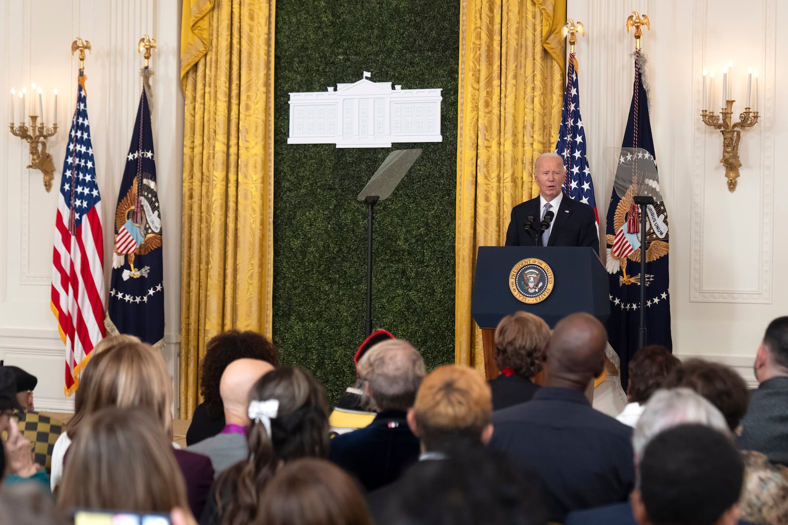 President Joe Biden speaks during a National Arts and Humanities Reception in the East Room at the White House in Washington, Monday, Oct. 21, 2024. (AP Photo/Mark Schiefelbein)