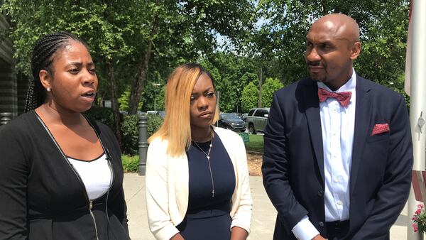 Attorneys Kayla Bumpus (left) and Muwali Davis (right) speak about Ju’Nea Turner’s case during a news conference Wednesday. RAISA HABERSHAM / RAISA.HABERSHAM@AJC.COM